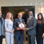Consul General Zaman Mehdi presents a made-in-Pakistan football to Chicago Mayor Brandon Johnson