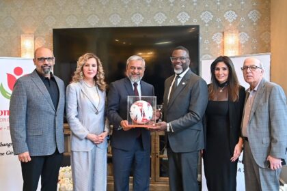 Consul General Zaman Mehdi presents a made-in-Pakistan football to Chicago Mayor Brandon Johnson