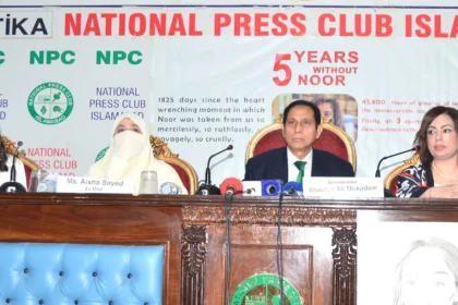 Participants at a remembrance ceremony for Noor Mukadam in Islamabad