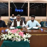 Representatives signing an agreement for PRA Pakistan members at Parliament House