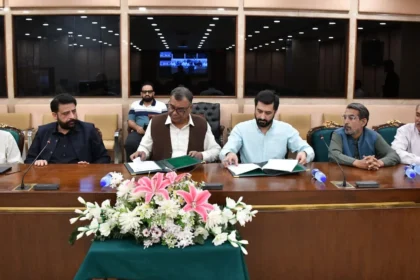Representatives signing an agreement for PRA Pakistan members at Parliament House