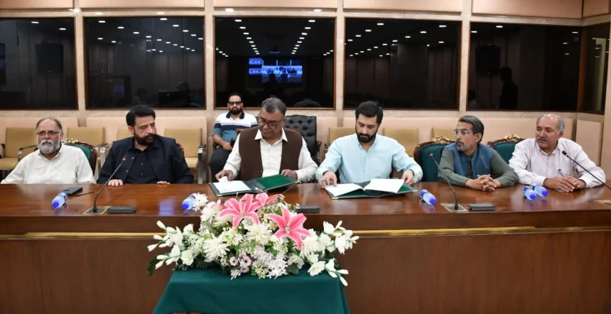 Representatives signing an agreement for PRA Pakistan members at Parliament House