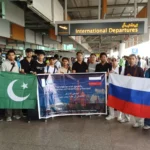 Students and teachers departing for Moscow after completing Russian language course