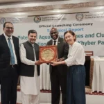 Officials and stakeholders attend the launch of the aquaculture technical report in Peshawar