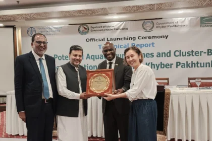 Officials and stakeholders attend the launch of the aquaculture technical report in Peshawar