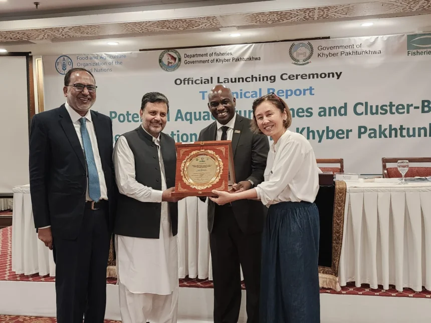 Officials and stakeholders attend the launch of the aquaculture technical report in Peshawar
