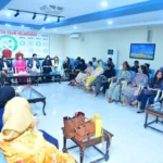 PIO Raeesa Adil speaking during a session with women journalists at National Press Club Islamabad