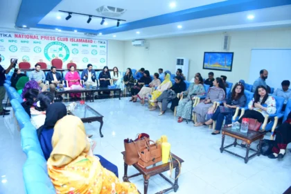 PIO Raeesa Adil speaking during a session with women journalists at National Press Club Islamabad