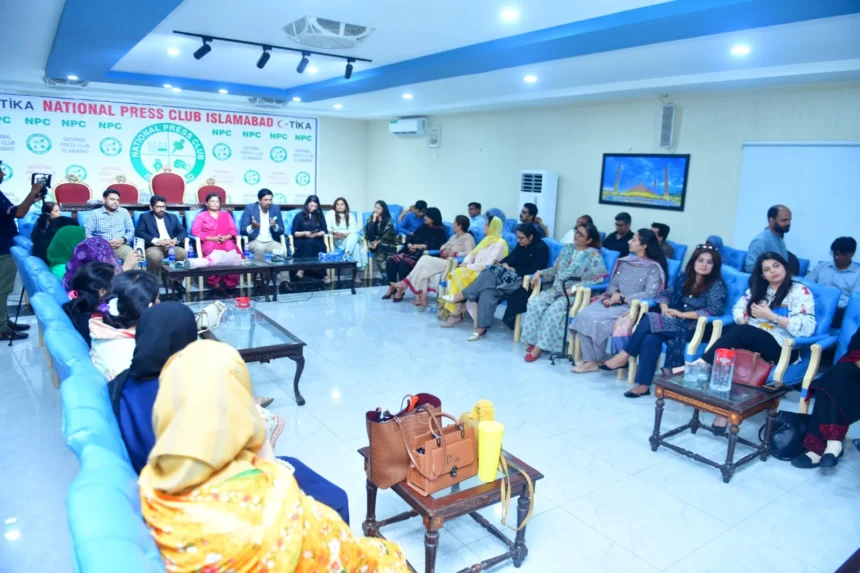 PIO Raeesa Adil speaking during a session with women journalists at National Press Club Islamabad