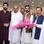 Azeem Khan receives bouquet after selection for Youth Programme role in Islamabad