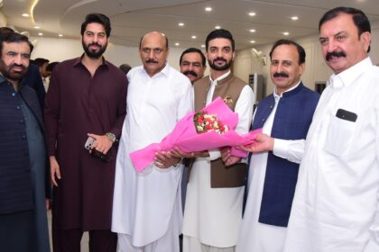 Azeem Khan receives bouquet after selection for Youth Programme role in Islamabad