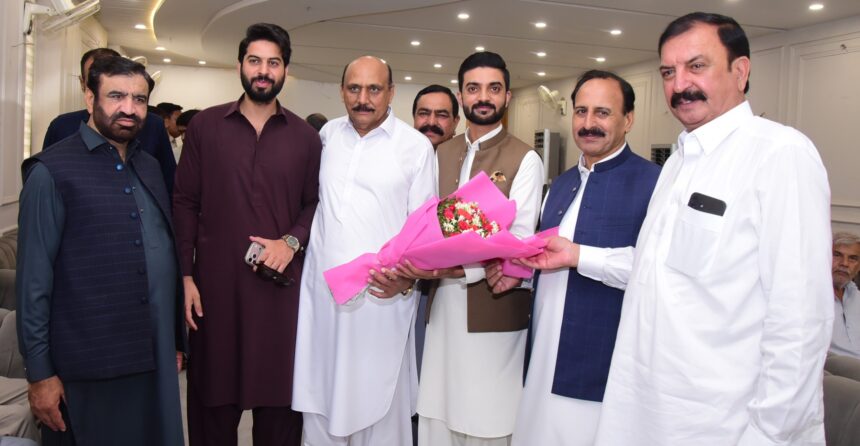 Azeem Khan receives bouquet after selection for Youth Programme role in Islamabad