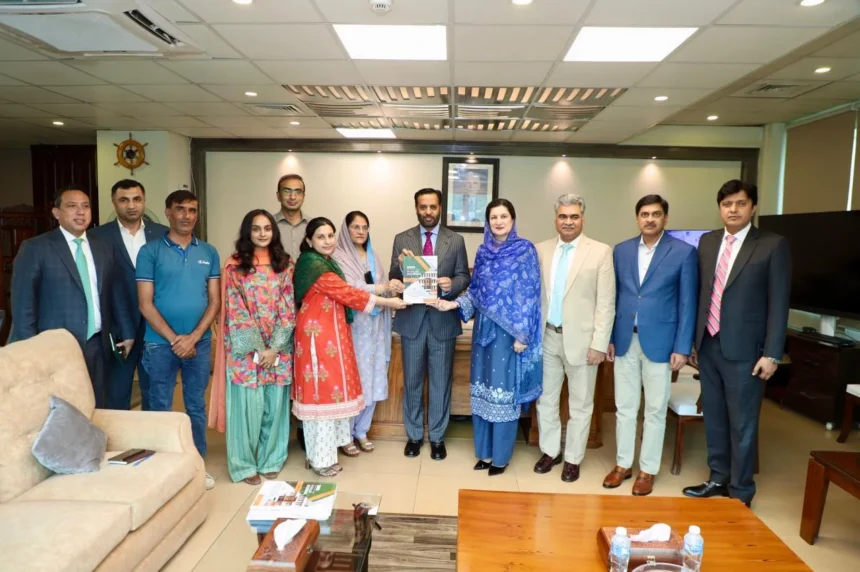 DHO Islamabad annual journal book presented to Federal Health Minister Syed Mustafa Kamal
