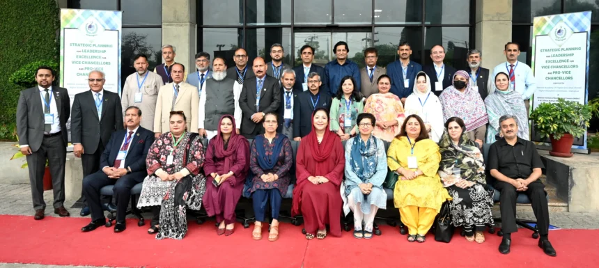 Vice Chancellors and senior university officials pose with Minister of State Wajiha Qamar at the HEC workshop