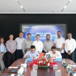 Hoymiles and Harisun Energy officials at partnership signing in China