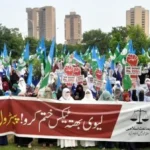 Women holding placards during Jamaat-i-Islami protest outside National Press Club Islamabad
