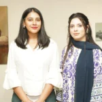 Visitors view artworks at the PNCA Young Graduates Exhibition in Islamabad