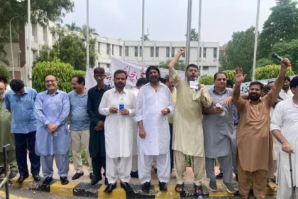 Punjab University teachers and employees protesting in Lahore