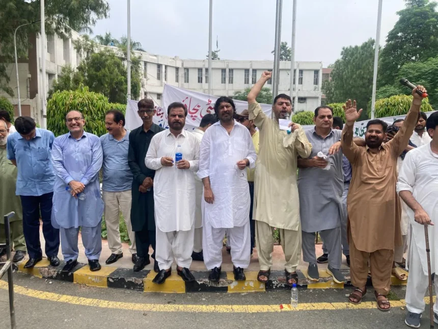 Punjab University teachers and employees protesting in Lahore