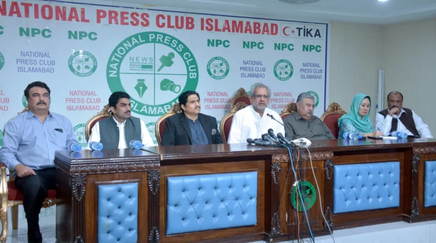 Shahid Khaqan Abbasi addressing a press conference at National Press Club Islamabad