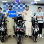 TECNO Pakistan representatives with REVOO e-bike winners