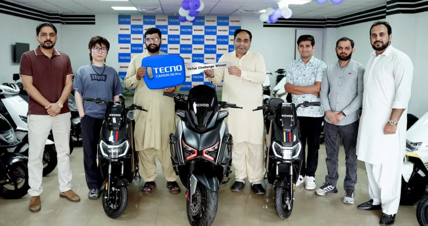 TECNO Pakistan representatives with REVOO e-bike winners