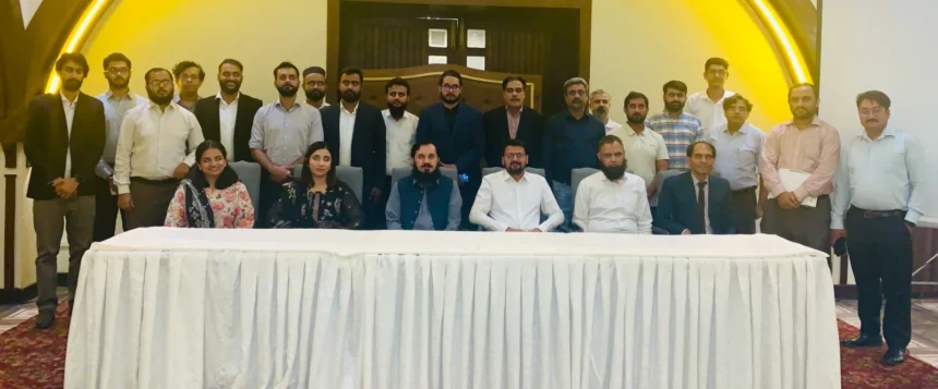 Participants at ADS national dialogue on textile compliance and power market transition in Islamabad