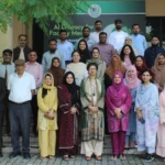 Faculty members attending NAHE AI literacy training at HEC Smart Classroom