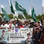 Vehicles decorated with national flags during Top City-1 Defence Day motor rally in Islamabad
