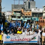Participants carrying placards during MSO rally for protection of Haramain Sharifain in Rawalpindi