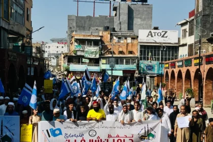 Participants carrying placards during MSO rally for protection of Haramain Sharifain in Rawalpindi