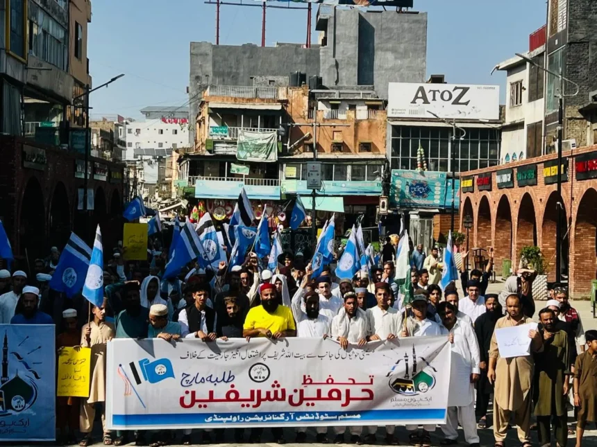 Participants carrying placards during MSO rally for protection of Haramain Sharifain in Rawalpindi