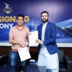 Lahore Qalandars and UMT officials signing MoU for young cricketers