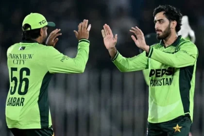 Arafat Minhas batting and bowling for Pakistan in an ODI tri-series match against England