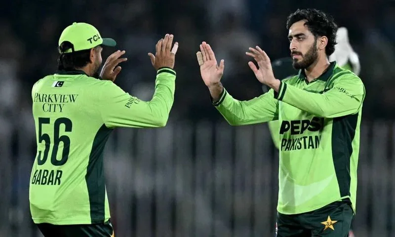 Arafat Minhas batting and bowling for Pakistan in an ODI tri-series match against England
