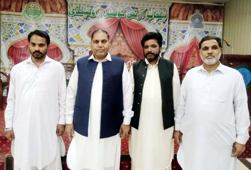 Dr Muhammad Hanif Mughal speaking during a meeting in Rawalpindi