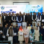 HEC officials receiving SAP S/4HANA training certificates from Dr Zia Ul Haq