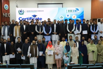 HEC officials receiving SAP S/4HANA training certificates from Dr Zia Ul Haq