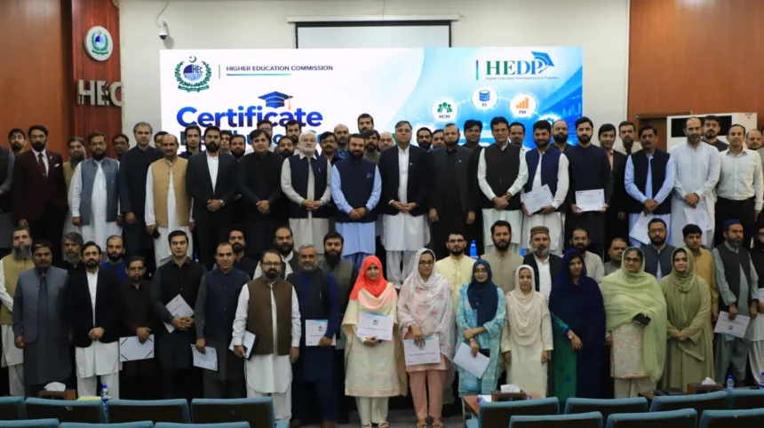 HEC officials receiving SAP S/4HANA training certificates from Dr Zia Ul Haq