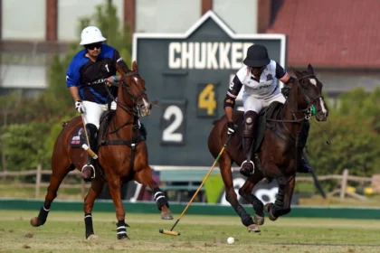 Polo players in action during the JPF Pink Polo Cup at Jinnah Polo Fields Lahore
