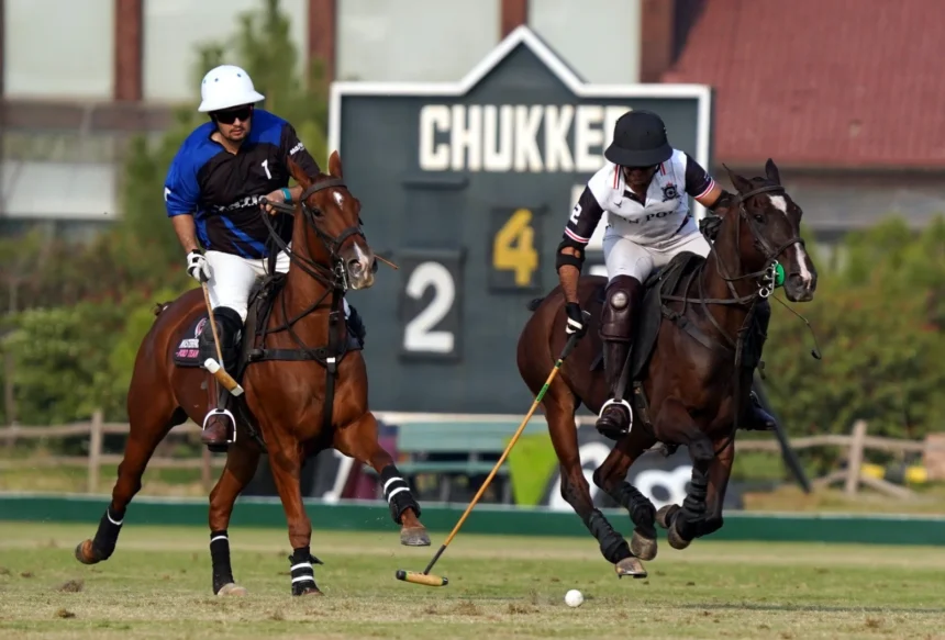 Polo players in action during the JPF Pink Polo Cup at Jinnah Polo Fields Lahore