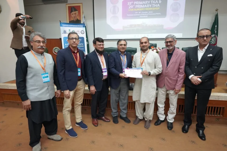 Participants and faculty at the live knee and hip arthroplasty workshop at PIMS Islamabad