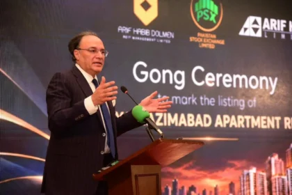 Finance Minister Muhammad Aurangzeb addressing gong ceremony at Pakistan Stock Exchange in Karachi